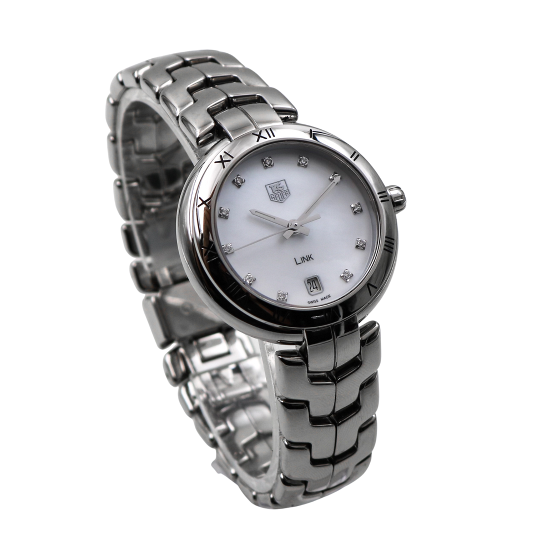 Left side view of the TAG Heuer Link Ladies Watch, highlighting the polished stainless steel case and the crown.