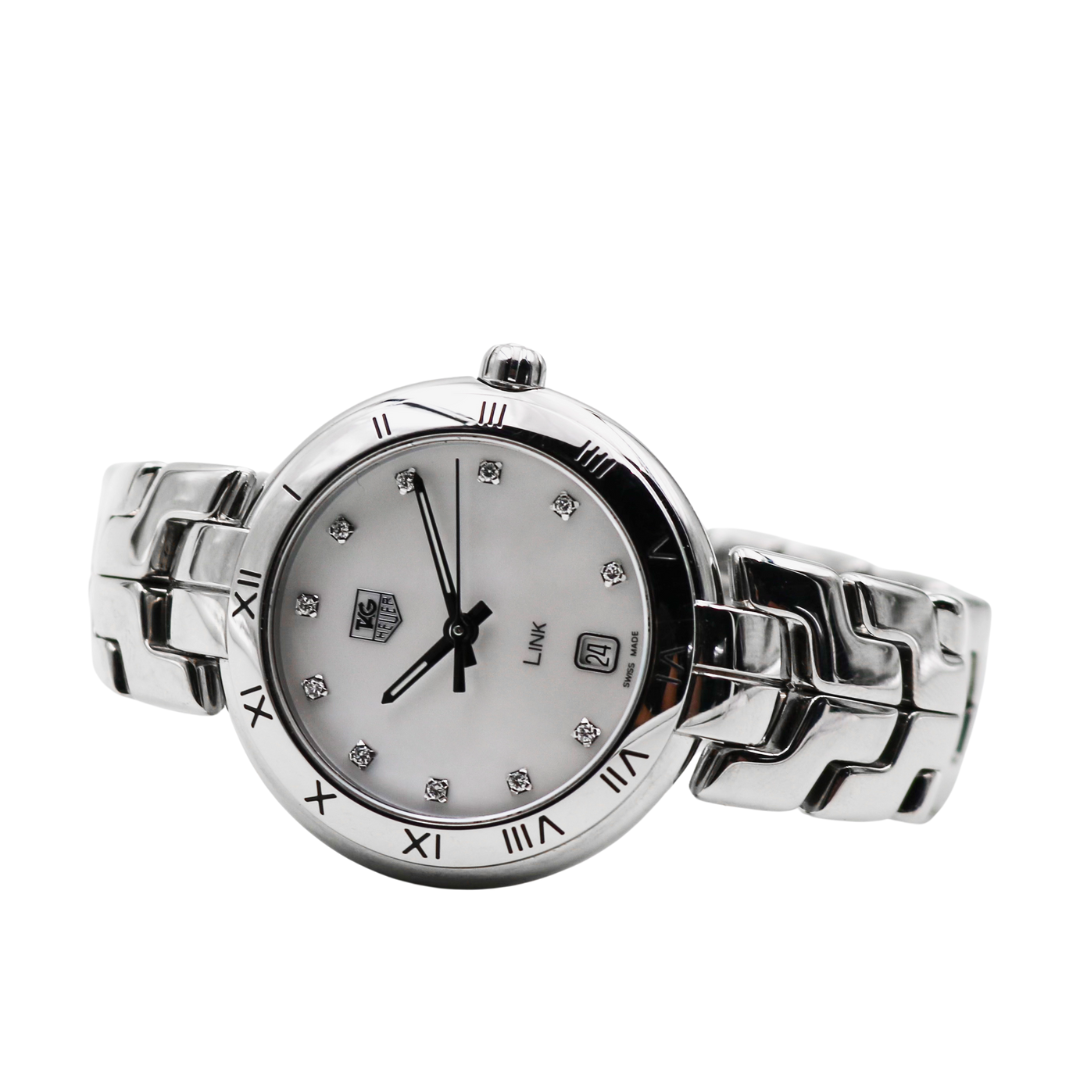 View of the TAG Heuer Link Ladies Watch lying on its side, displaying the profile of the case and bracelet.